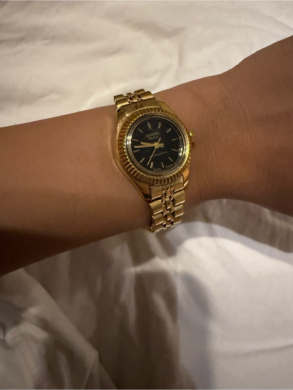 Geneva Gold Tone Watch with Black Dial